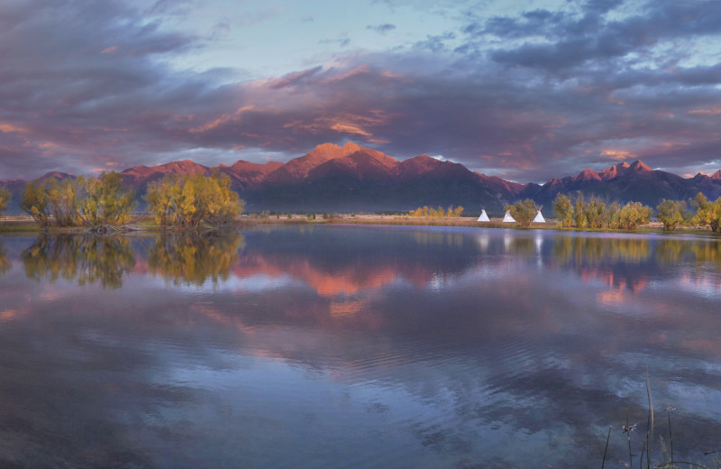 Sunset lake view at Ninepipes Lodge.