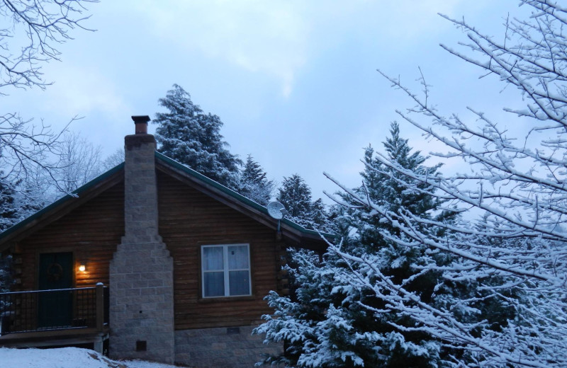 Cabin in winter at Whispering Hills Cabins.