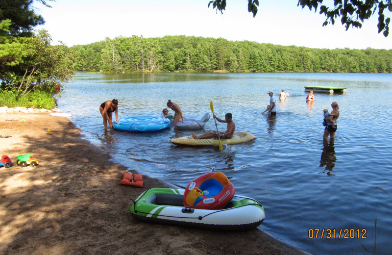 Lake and beach at White Birch Village Resort.