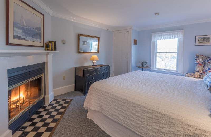 Guest room with fireplace at Five Gables Inn.