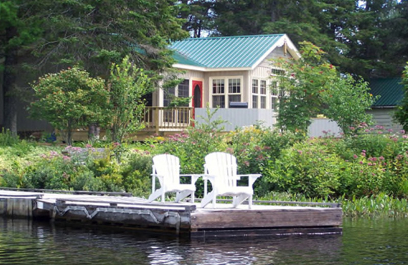 Lakeside Lounging at Woodland Echoes Cottage Resort