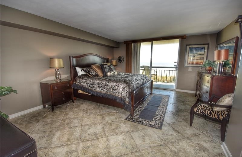 Rental bedroom at Barefoot Resort Rentals.