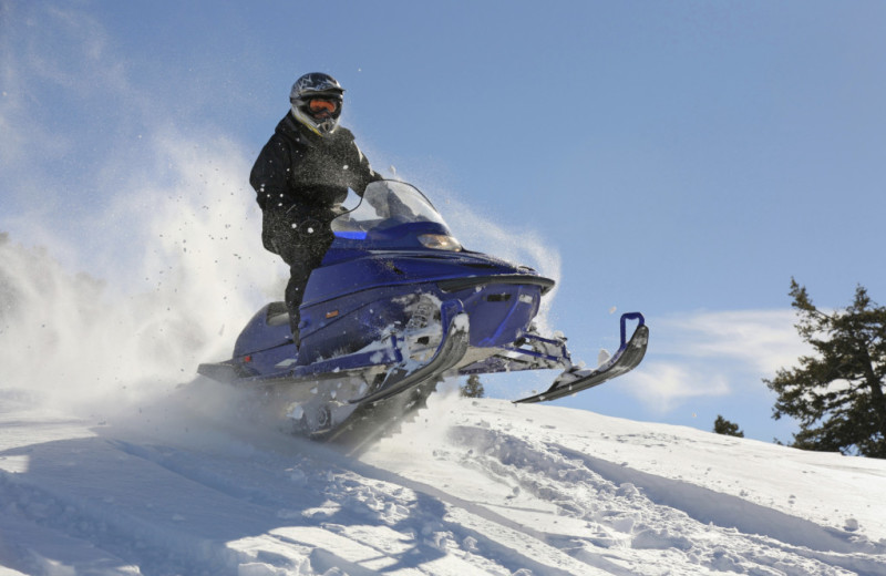 Snowmobiling near Tsasdi Resort.