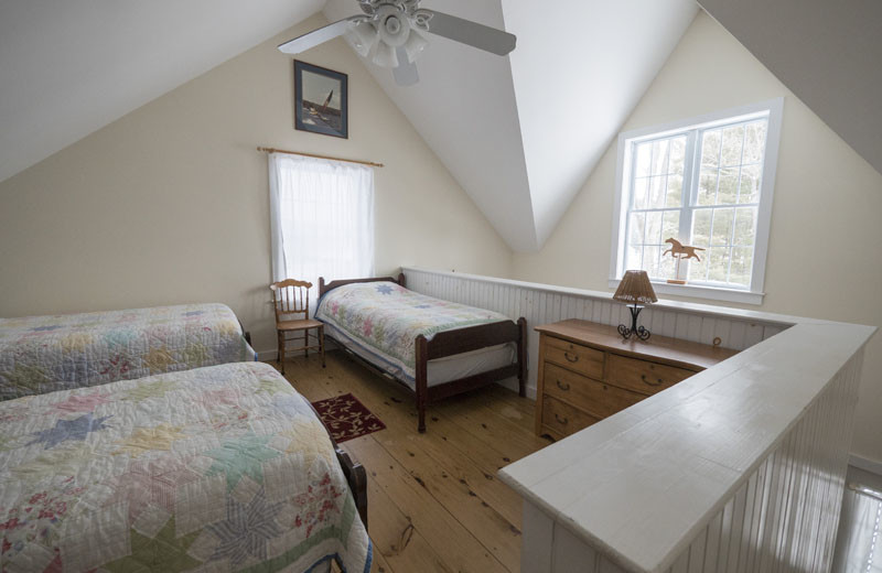 Cottage loft bedroom at Sunapee Harbor Cottages.