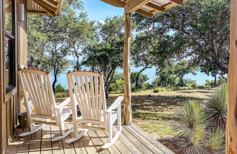 Cabin porch at Canyon of the Eagles Nature Park & Resort.