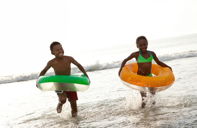 Kids on the beach at South Wind on the Ocean.