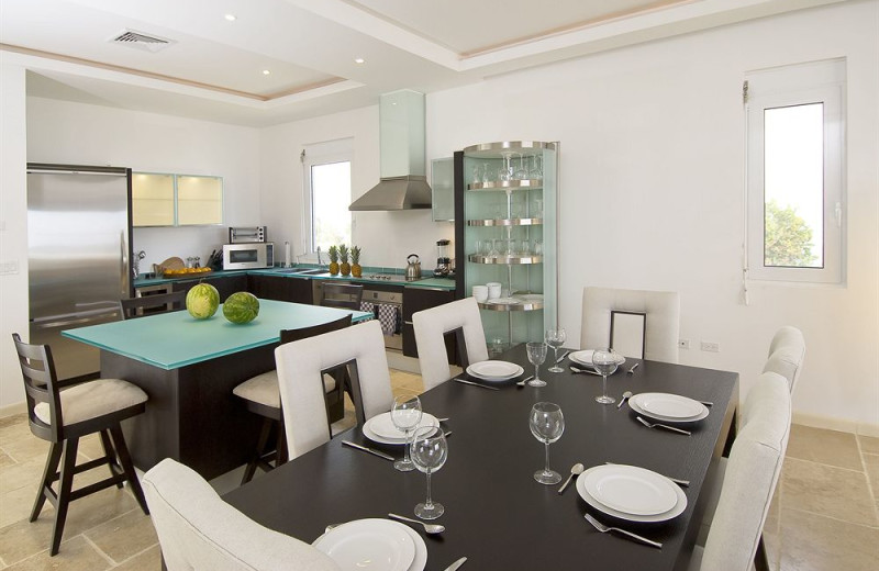 Vacation rental kitchen and dining room at Coral Beach Club.