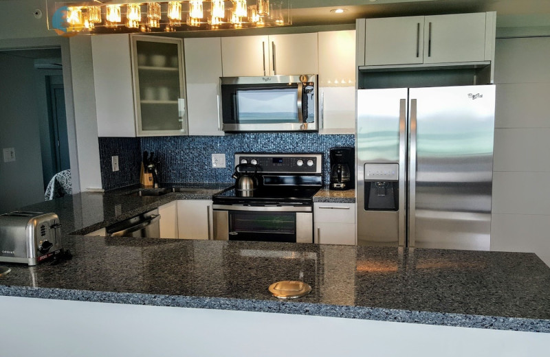 Rental kitchen at HORA Vacation Rentals.