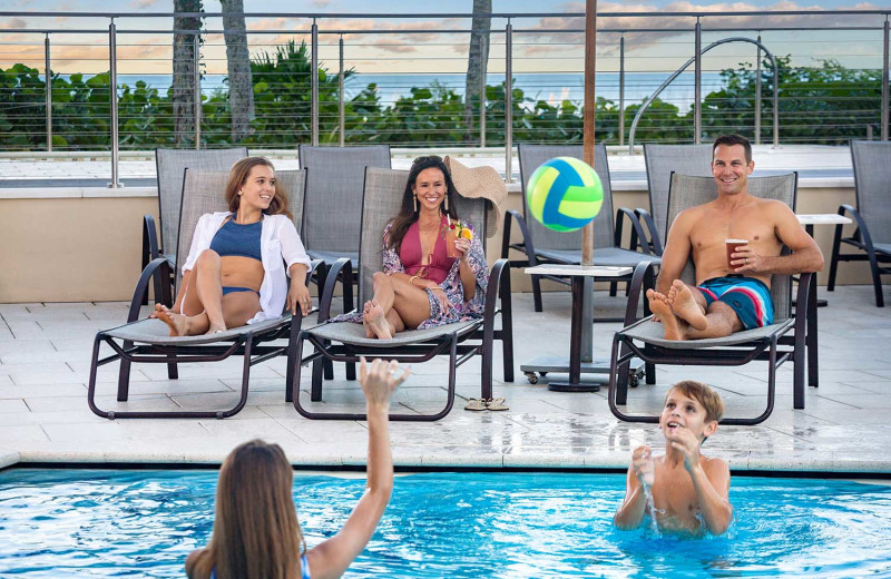 Family in pool at Hilton Marco Island Beach Resort.