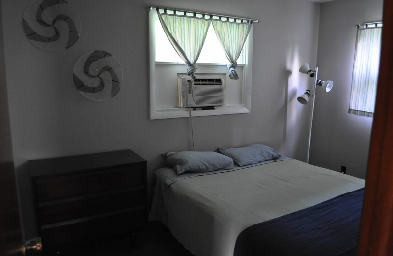 Cabin bedroom at Lake Breeze Resort.