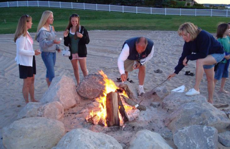 Campfire on the beach at Bay Harbor Resort and Marina.