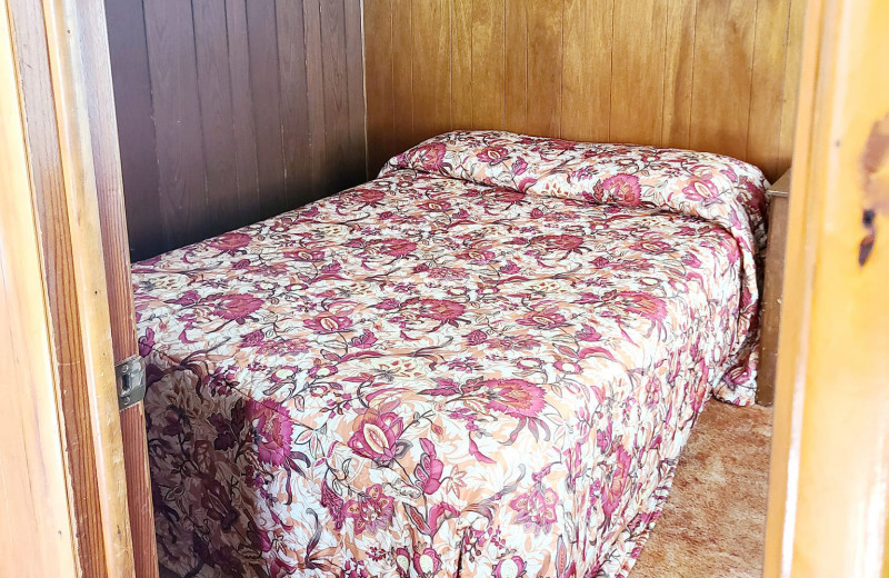 Cabin bedroom at South Turtle Lake Resort.