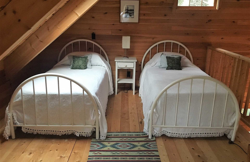 Rental bedroom at Acadia Cottage Rentals.
