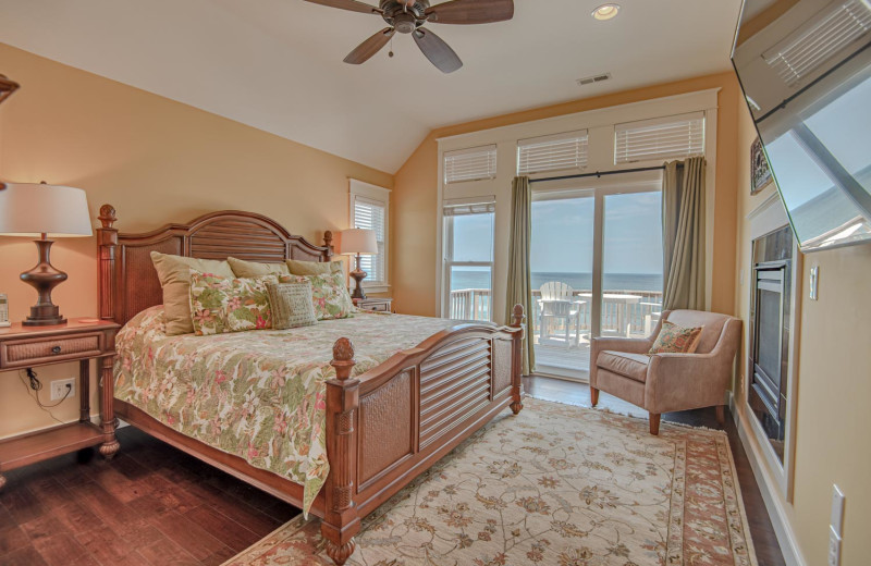 Rental bedroom at Joe Lamb Jr. & Associates Vacation Rentals.