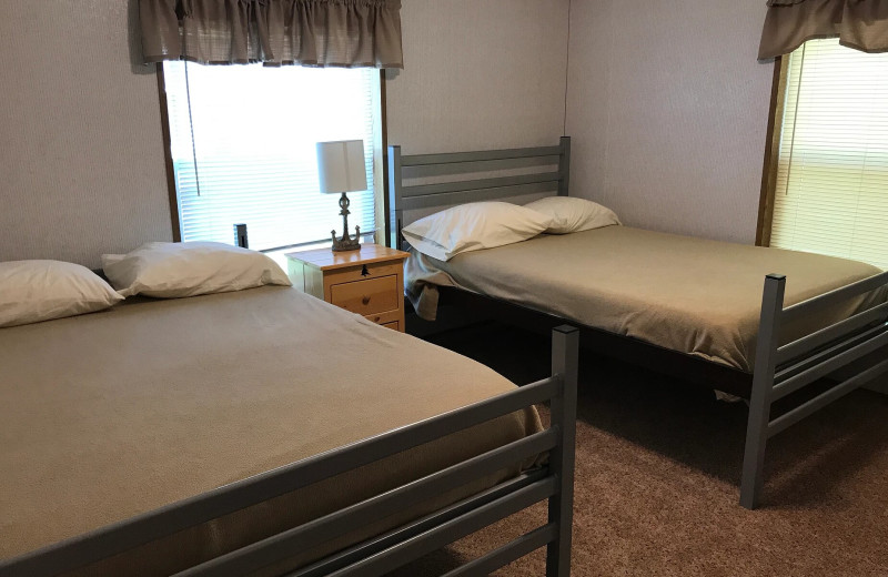 Cabin bedroom at Sand Lake Resort.