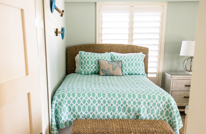 Guest bedroom at Island House Beach Resort.