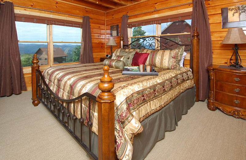 Cabin bedroom at Timber Tops Luxury Cabin Rentals.