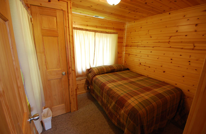 Cabin bedroom at Birch Forest Lodge.