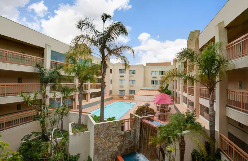 Outdoor pool at Ramada by Wyndham Hawthorne LAX / LA Stadium.