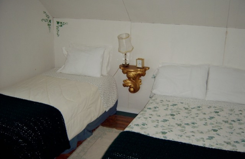 Cabin bedroom at Kramer Pond Lodge.