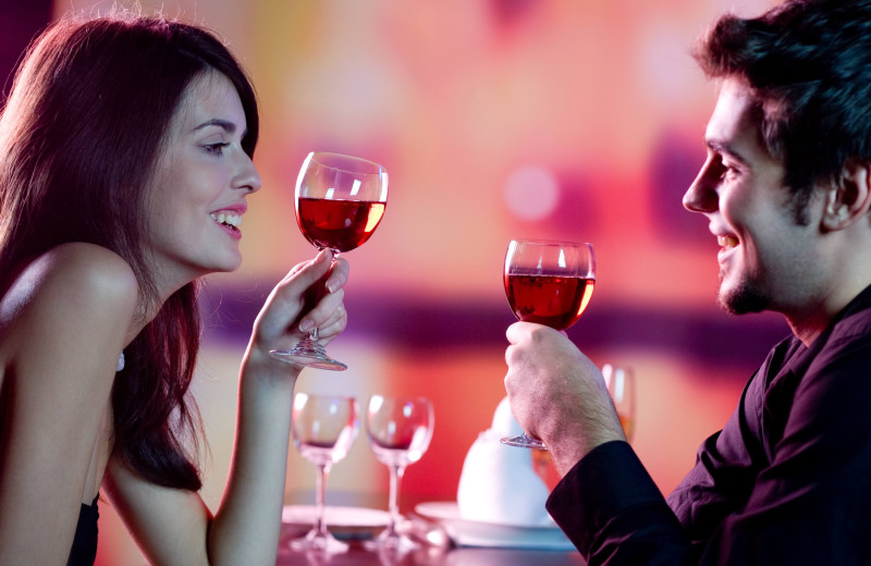 Couple dining at Sanctuary Vacation Rentals at Sandbridge.