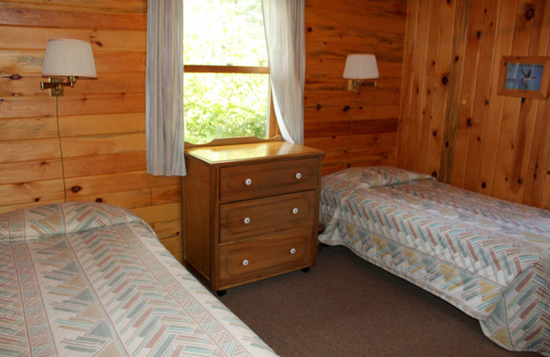 Cabin bedroom at Muskego Point Resort.