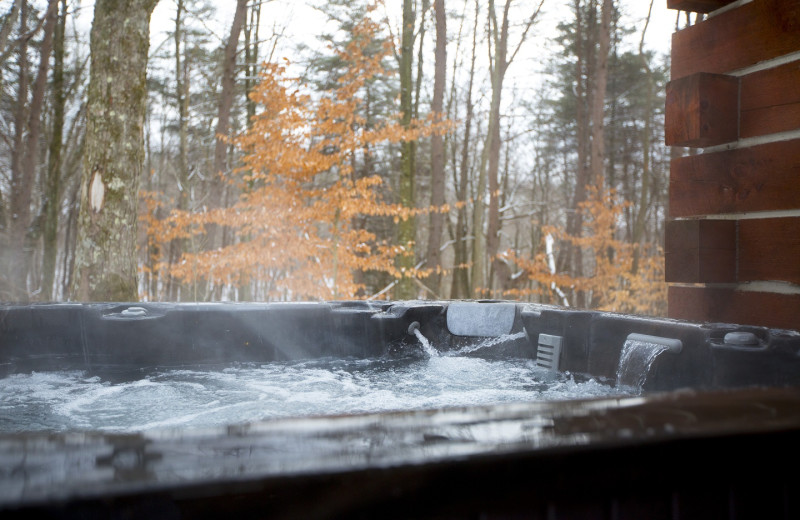 Cabin hot tub at Aspen Ridge.