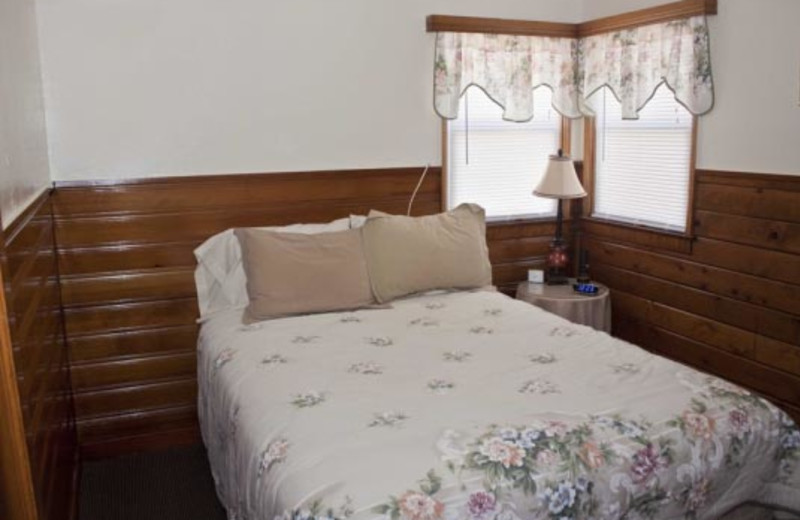 Cottage bedroom at Blue Horizon Lodge.