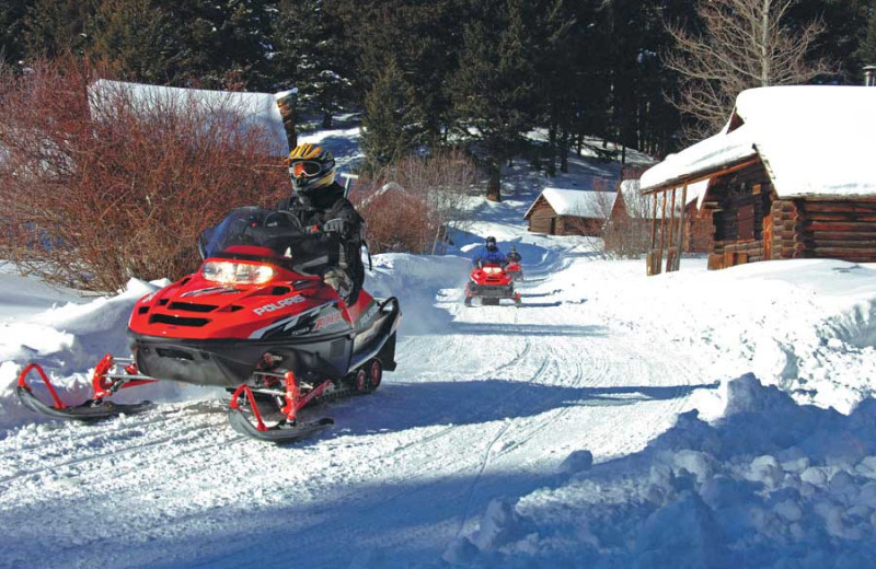 Snowmobiling at The Resort at Paws Up.