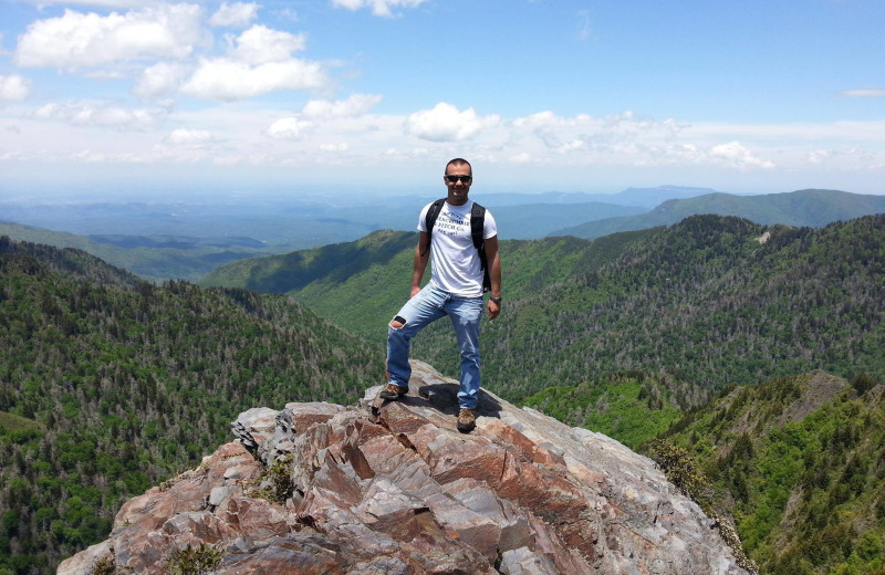 Hiking in the mountains at Cabin Fever Vacations.