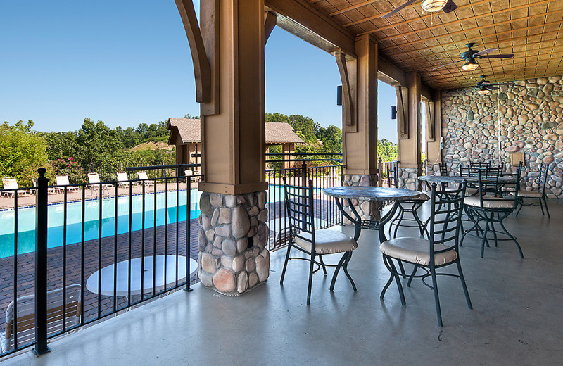 Sitting area near pool at Legacy Mountain Resort