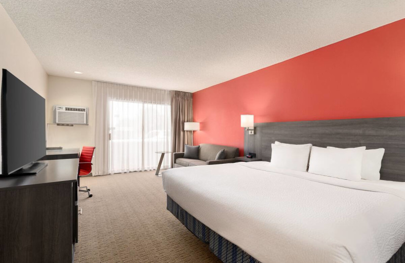 Guest room at Ramada by Wyndham Tucson Airport.