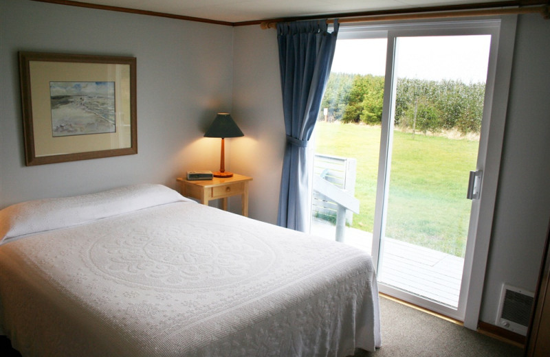 Cottage bedroom at The Anchorage Cottages.