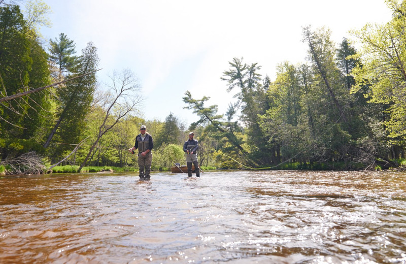 Fishing at Pere Marquette River Lodge.