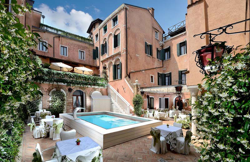 Outdoor pool at Hotel Giorgione.