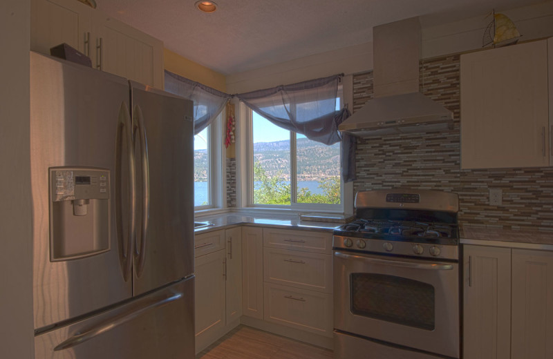 Rental kitchen at realTopia Vacation Rentals.