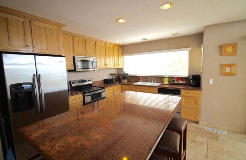 Rental kitchen Vacation Rentals by McLain Properties.