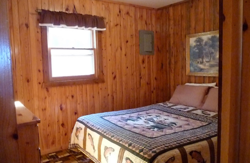 Cabin bedroom at Anderson's Starlight Bay Resort.