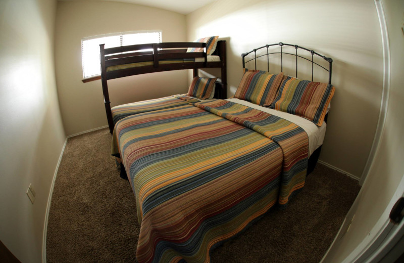 Cottage bedroom at Hill Country RV Resort & Cottage Rentals.