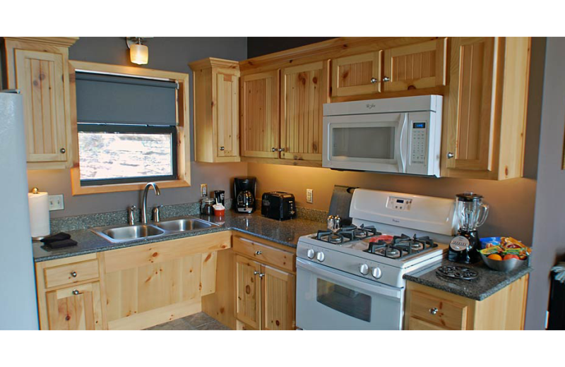 Cabin kitchen at Beaver Lakefront Cabins.