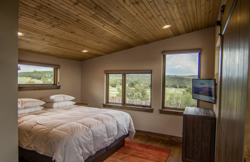 Cabin bedroom at Royal Gorge Cabins. 