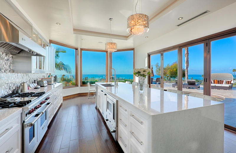 Rental kitchen at Seabreeze Vacation Rentals, LLC-Orange County.