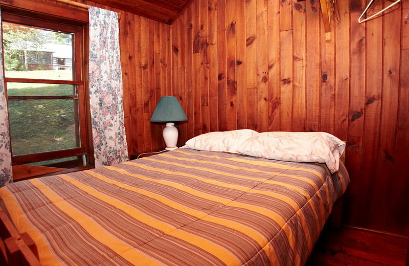 Cabin bedroom at Fernleigh Lodge.