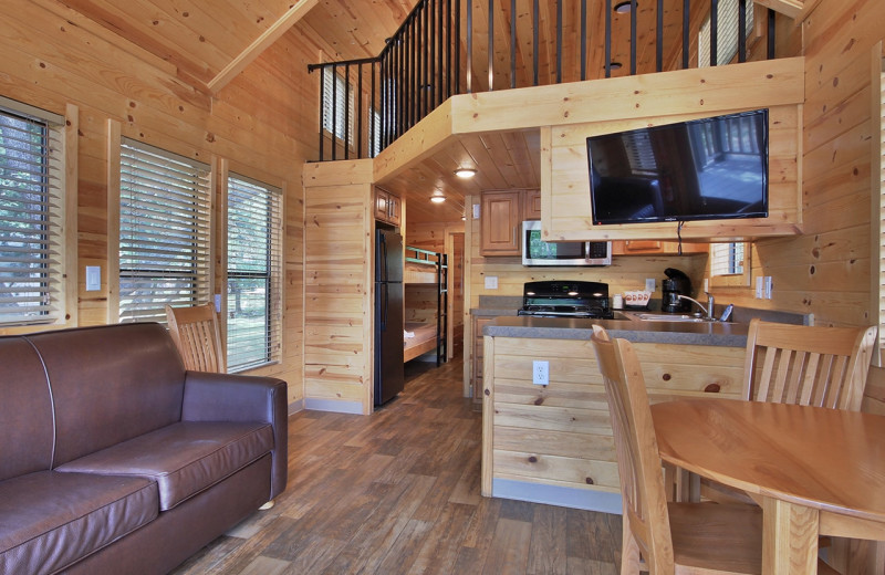 Cabin living room at Yogi Bear's Jellystone Park Hill Country.