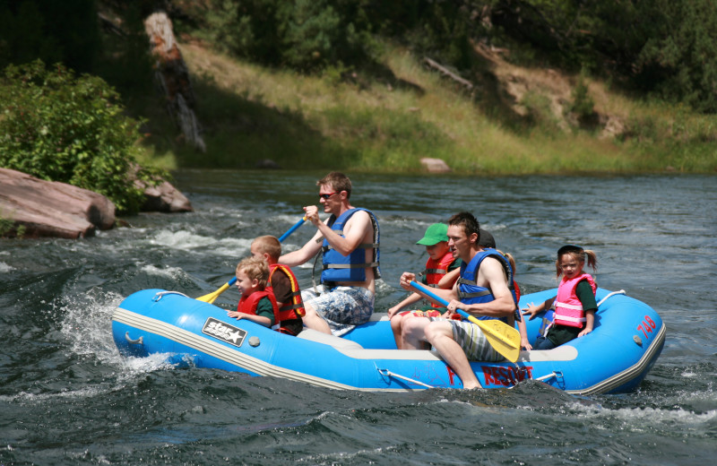 Family rafting at Flaming Gorge Lodge.