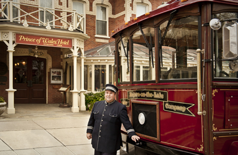 Guy by trolly at Prince of Wales Hotel.