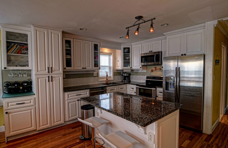 Vacation rental kitchen at Century 21 Action Inc.