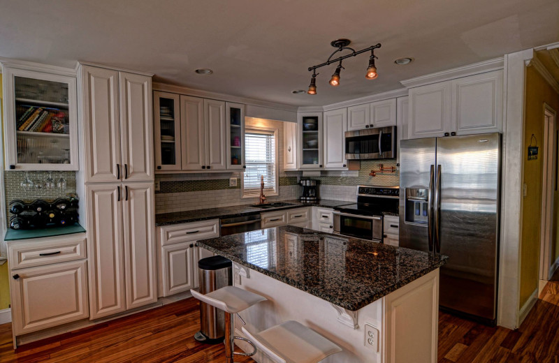 Vacation rental kitchen at Century 21 Action Inc. 