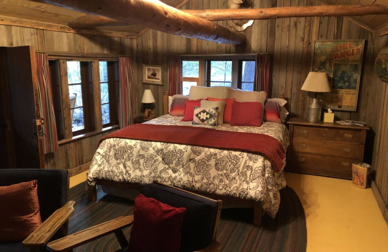 Cabin bedroom at Tumbling River Ranch.