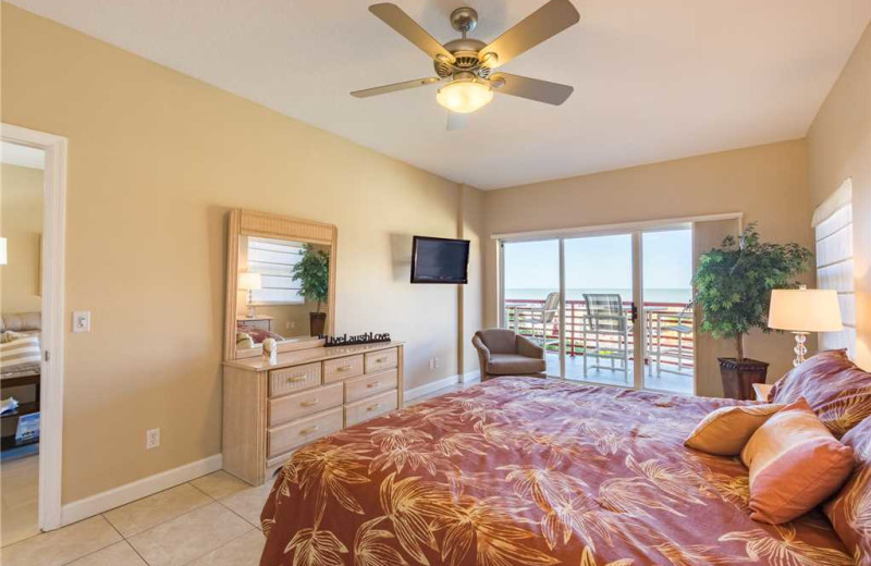 Rental bedroom at SunHost Resorts.